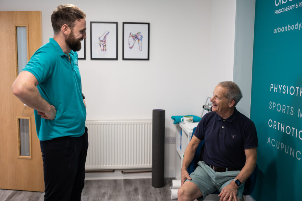 image of a man having a physiotherapy  consultation