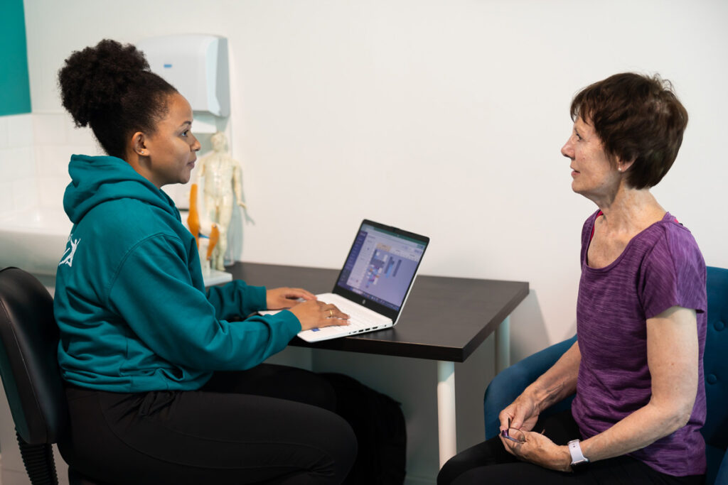 image of a back pain consultation at Urban Body