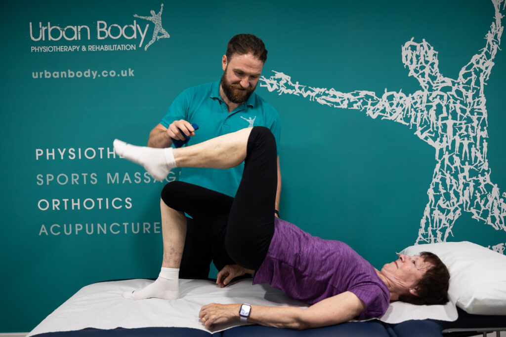 featured image of a physiotherapist at Urban Body giving treatment